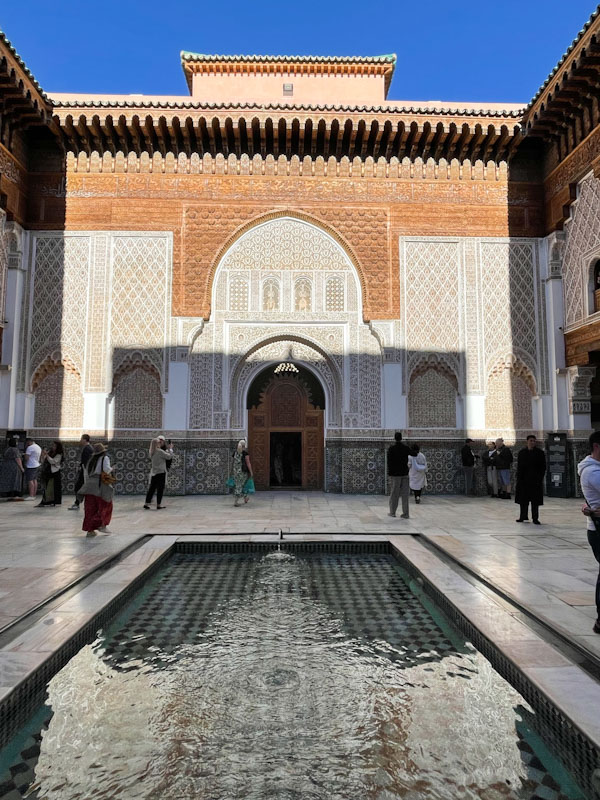 Shadow cast on one of the entrances to the courtyard, Madrassa Ben Youssef, Marrakesh, Morocco, January 2025
