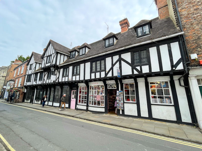 Large timber framed shop and doors, York, North Yorkshire, June 2024