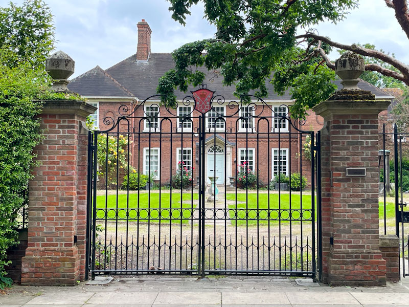 Gates and door to beautiful house, York, North Yorkshire, June 2024