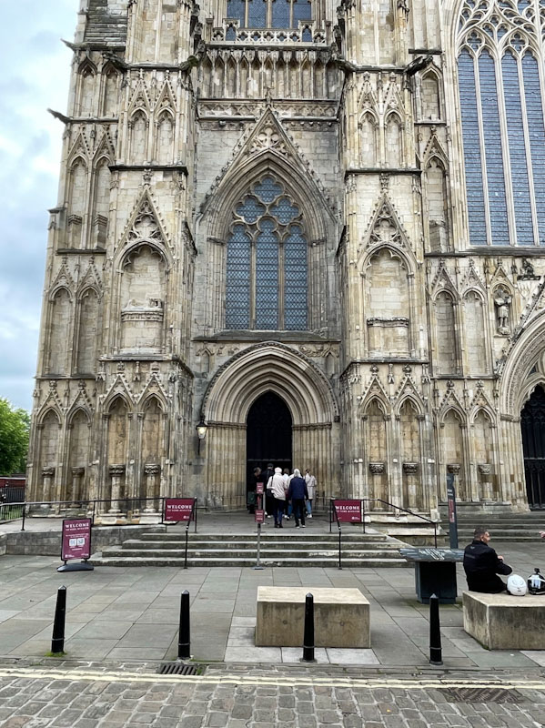 Left-hand door and entrance on the west front of York Minster, York, North Yorkshire, June 2024