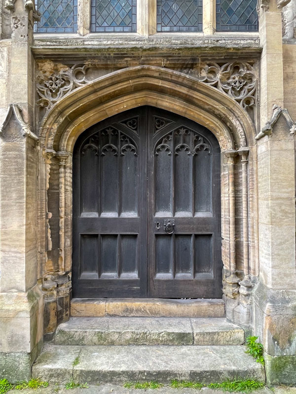 Door to St Michael le Belfrey church, York, North Yorkshire, June 2024