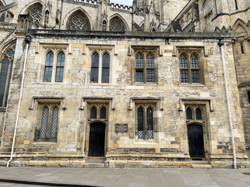 Doors to the diocesan registry and chapter clerk's office, York Minster, York, North Yorkshire, June 2024