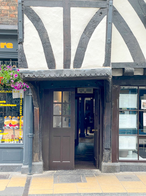 Shop door, York, North Yorkshire, June 2024