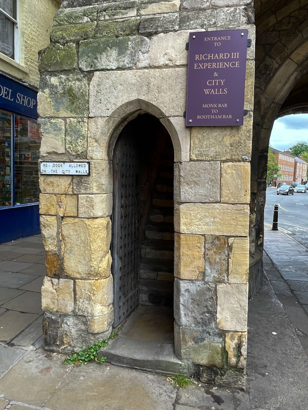 Entrance door to the city wall, Monk Bar, city gate, York, North Yorkshire, June 2024