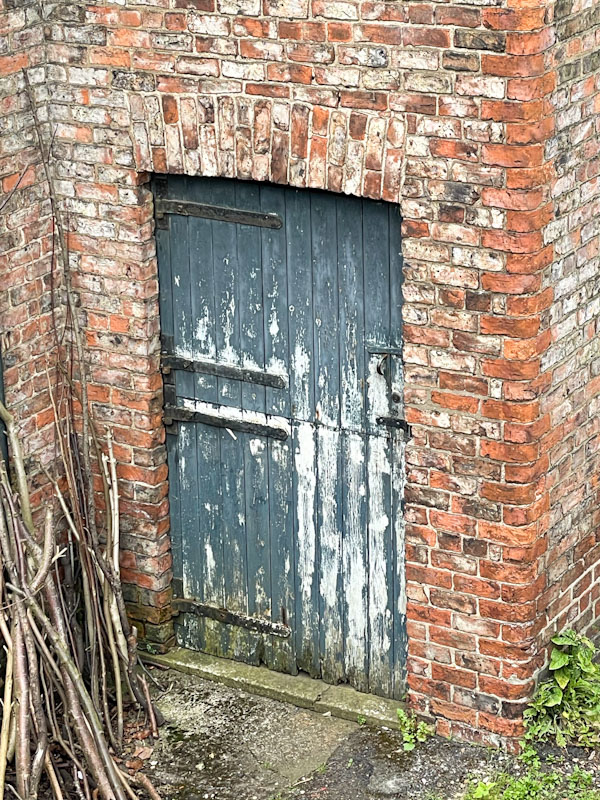 Well-worn stable door from the city wall, York, North Yorkshire, June 2024