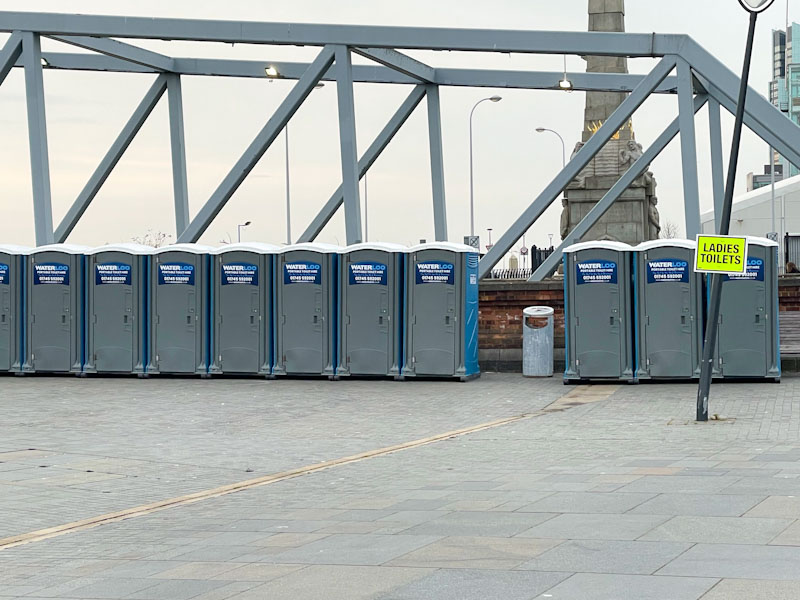 Portaloos for the runners - lots of doors, George's Dock Gates, Liverpool, March 2025
