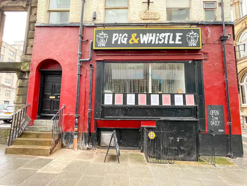 Pig and Whistle doors, Chapel Street, Liverpool, March 2025