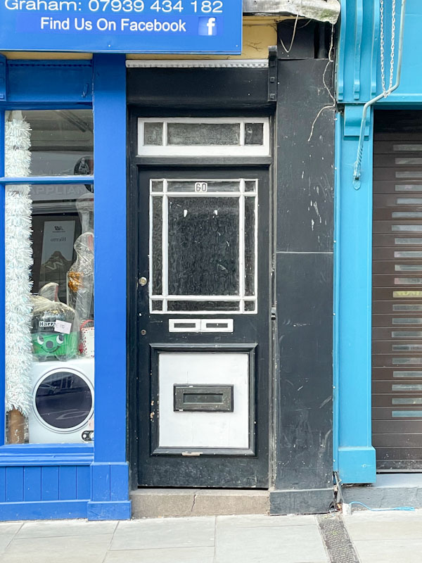 Unusual black and white door, Mardol, Shrewsbury, Shropshire, England, April 2025
