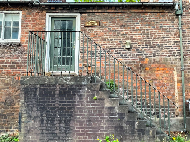 Steps leading up to a first floor door, Claremont Bank, Shrewsbury, Shropshire, April 2025