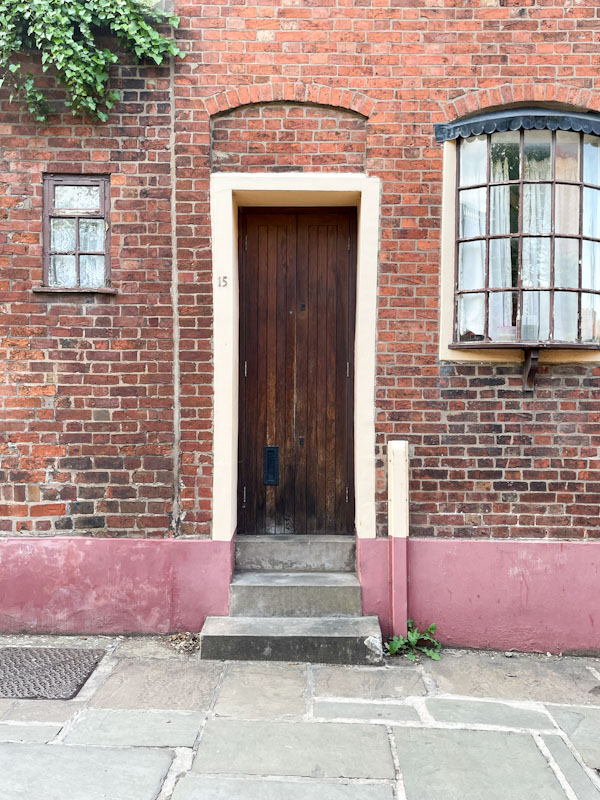Slender door and pretty bay window, Claremont Hill, Shrewsbury, Shropshire, April 2025