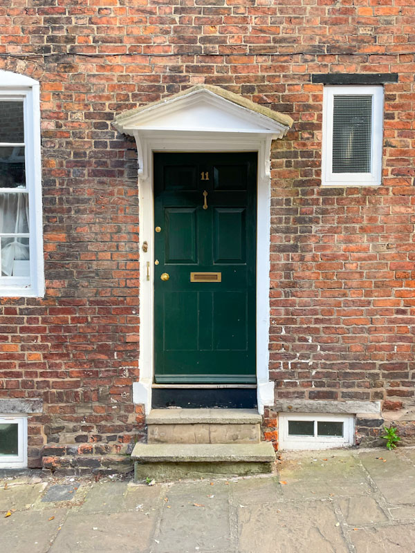 Door with small portico, Claremont Hill, Shrewsbury, Shropshire, April 2025
