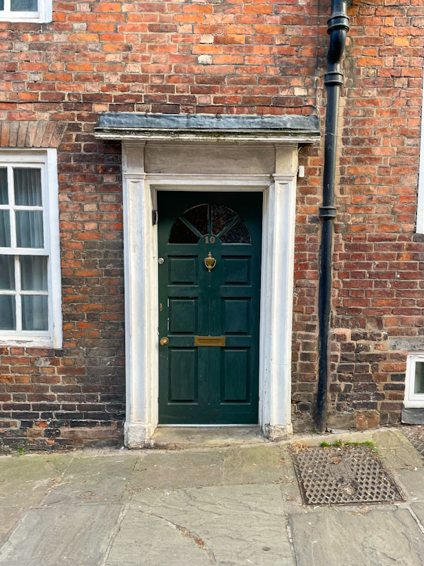 Door with flat roof, Claremont Hill, Shrewsbury, Shropshire, April 2025