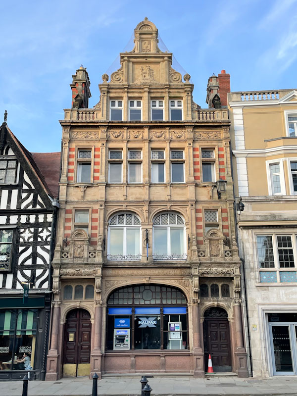 Twin doors one with brass kick boards, The Square, Shrewsbury, Shropshire, April 2025