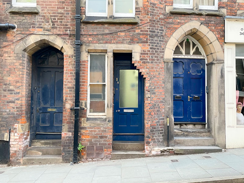 Three front doors, Dogpole, Shrewsbury, Shropshire, England, April 2025
