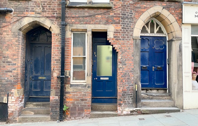 Three front doors, Dogpole, Shrewsbury, Shropshire, England, April 2025