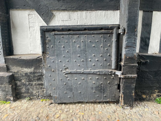 Studded basement door, Council House Court, Shrewsbury, Shropshire, England, August 2025