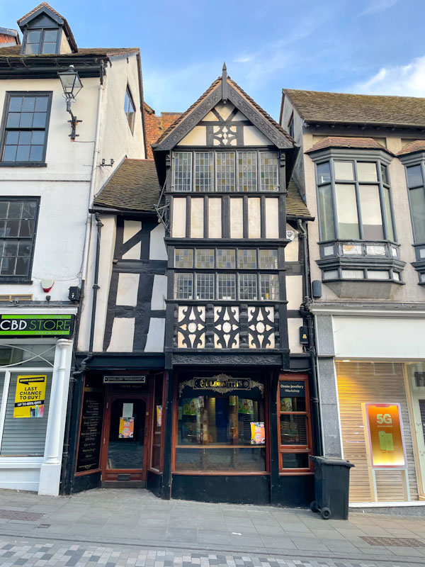 Shop door to a 16th century timber-framed building, Pride Hill, Shrewsbury, Shropshire, England, April 2026