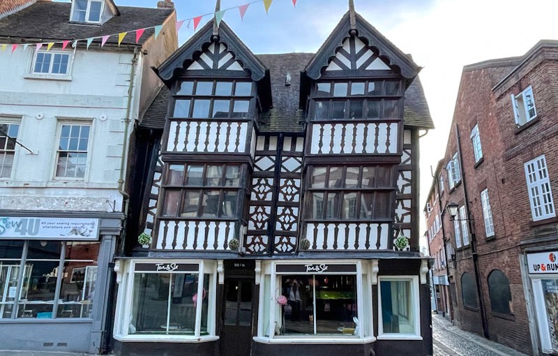Crooked building with small shop door, Mardol, Shrewsbury, Shropshire, England, April 2026