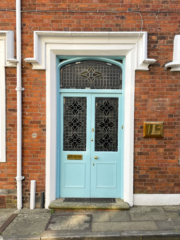 Wonderful light blue double door and stained glass windows, School Gardens, Shrewsbury, Shropshire, England, April 2025