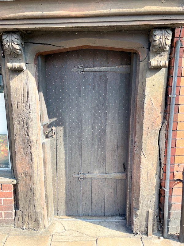 Beautiful old studded door and timber door frame, Frankwell, Shrewsbury, Shropshire, England, April 2025