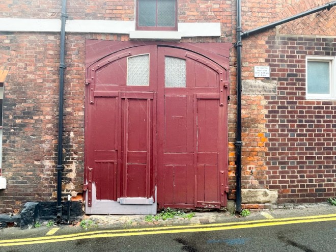 Panelled double archway doors, Belmont, Shrewsbury, Shropshire, England, August 2025