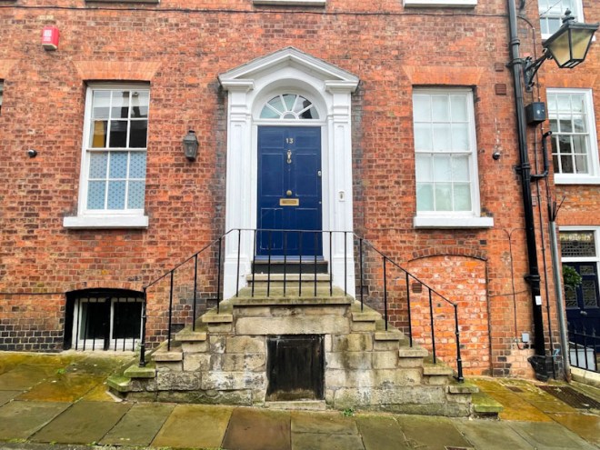 Grand steps leading up to a statement blue front door, Belmont, Shrewsbury, Shropshire, England, August 2025