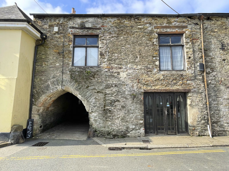 Archway and four panel glass and iron door, Quay Street, Lostwithiel, Cornwall, October 2026