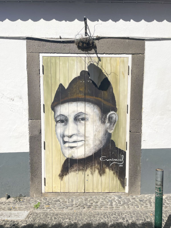 Door with portrait, Travessa das Torres, Funchal, Madeira, September 2025