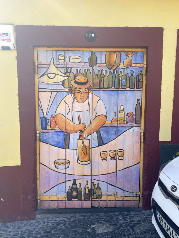 Door with a bar scene, Rua de Santa Maria, Funchal, Madeira, September 2025