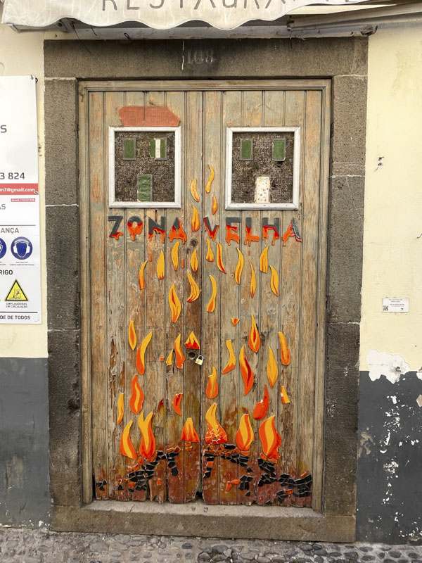 Flaming doors, Travessa Joao Caetano, Funchal, Madeira, Portugal, September 2025
