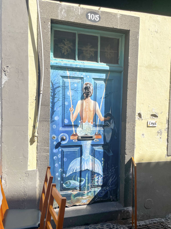 Mermaid on a swing door, Travessa Joao Caetano, Funchal, Madeira, Portugal, September 2025