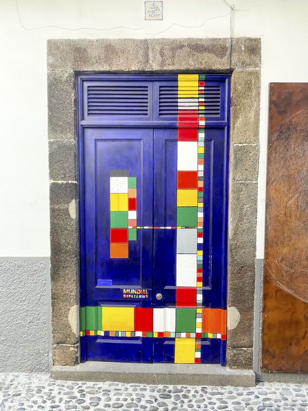 Door with a Mondrian-style pattern, Rua De Santa Maria, Funchal, Madeira, Portugal, September 2025