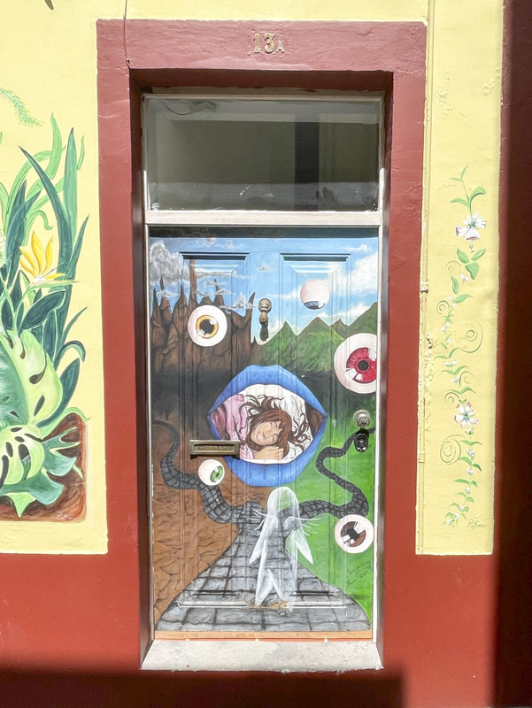 The stuff of dreams and nightmares on this door, Rua de SantaMaria, Funchal, Madeira, Portugal, September 2025